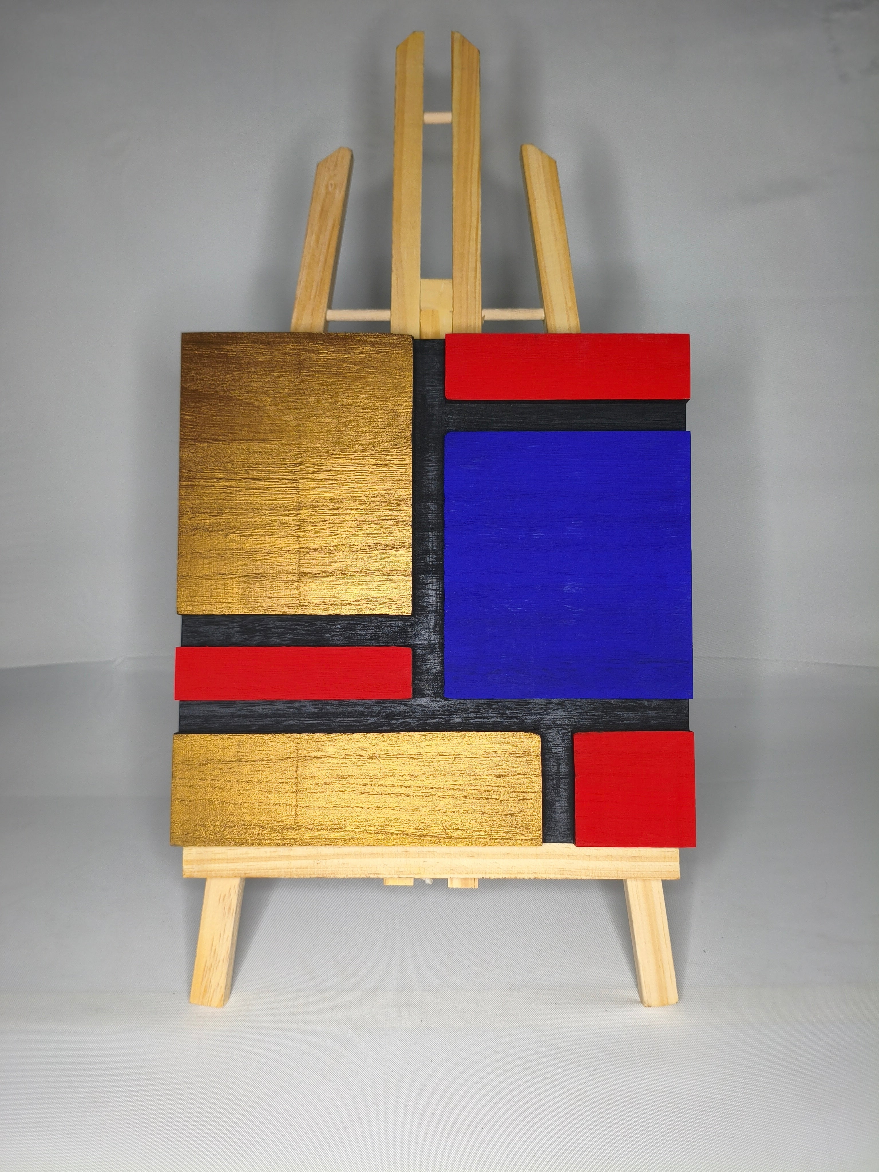 Quadro Geometrico Rosso, Blu e Oro – Omaggio a Mondrian – Legno di Paulonia 25x25