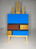 Quadro Neoplastico Blu, Oro e Marrone – Omaggio a Mondrian – Legno di Paulonia